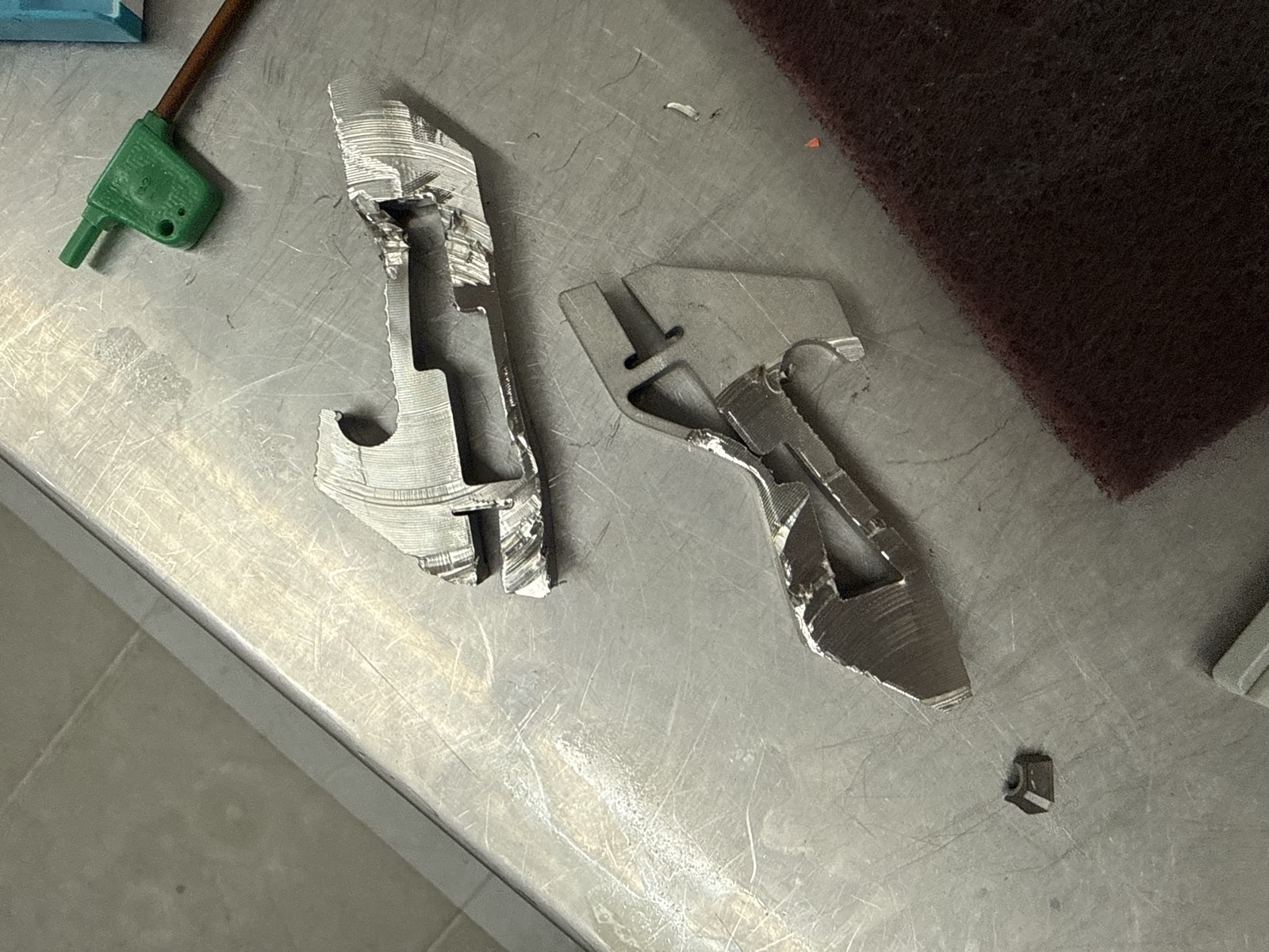 Scrapped stainless steel parts from broken tooling